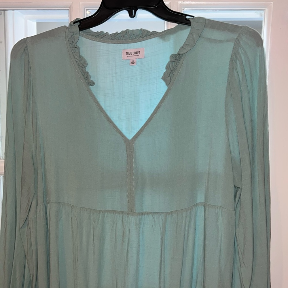 True Craft top.  Light blue/green.